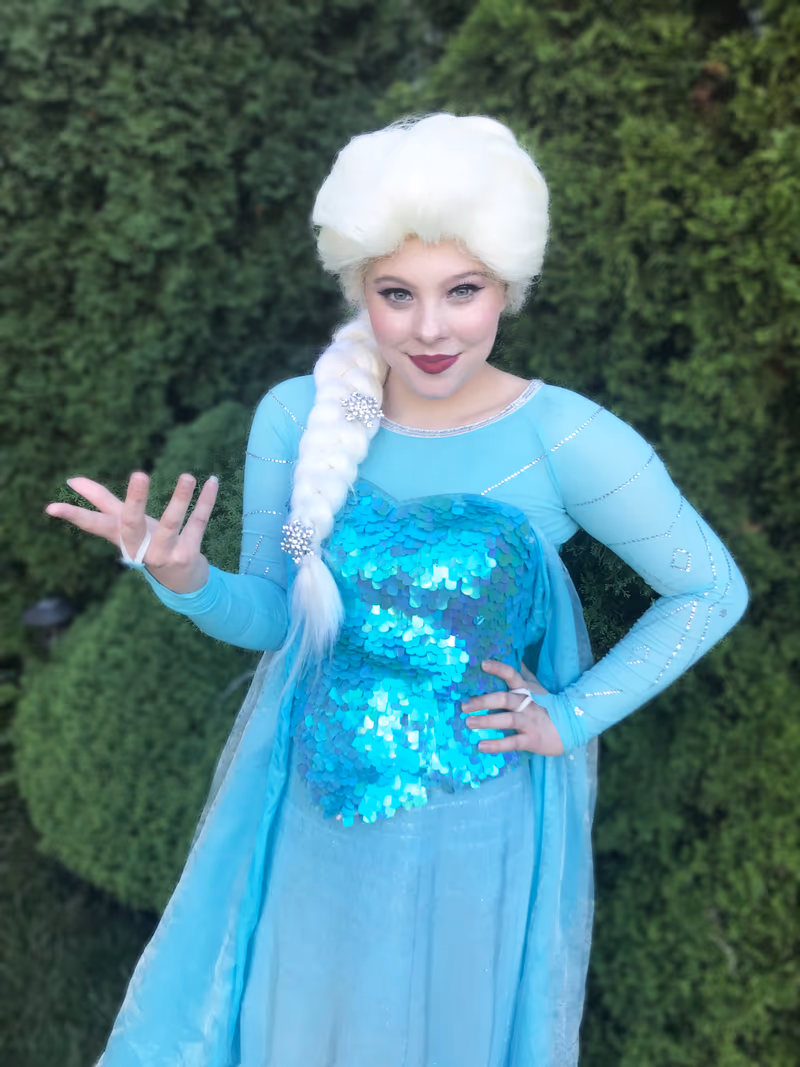 Elsa princess character with a welcoming wave | Magic At My Door