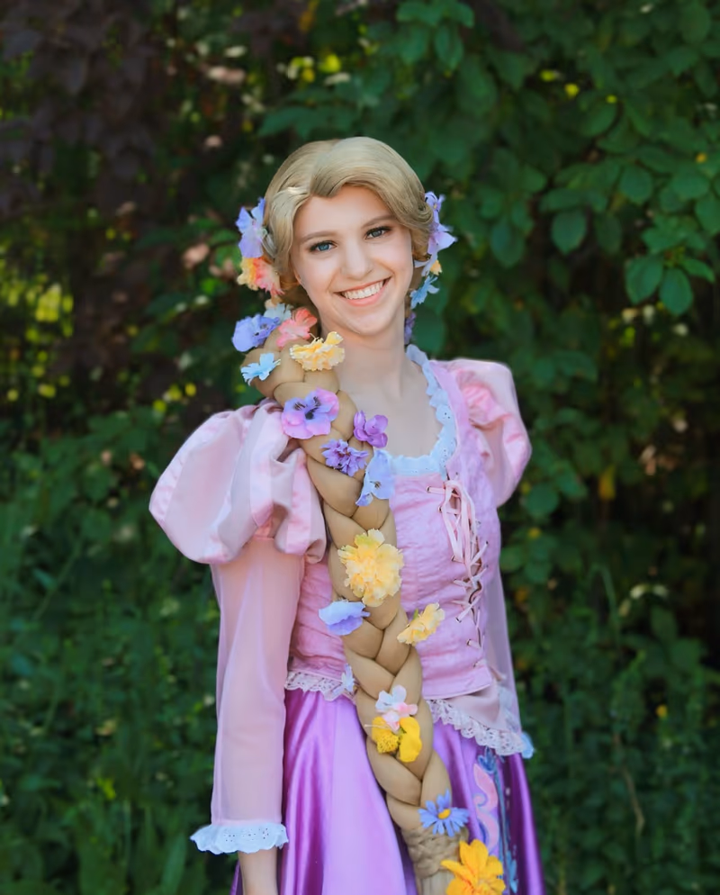 Rapunzel character entertainer with flower-braided hair | Magic At My Door